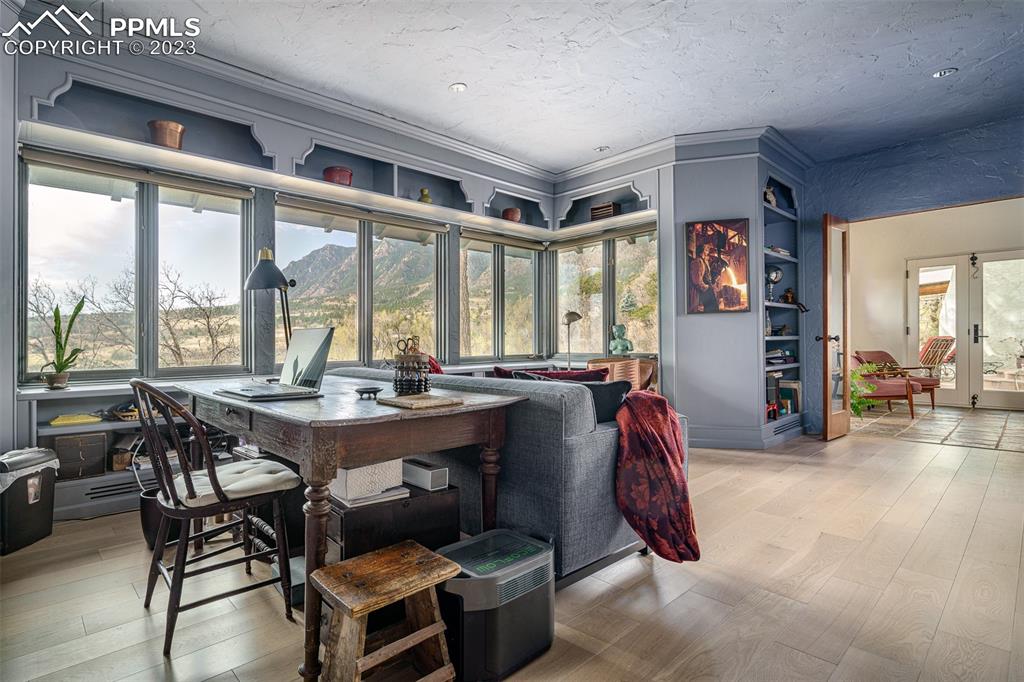 52 Marland Road Colorado Springs, CO 80906 - Photo 10 of 48 a view of a dining room with furniture window and outside view