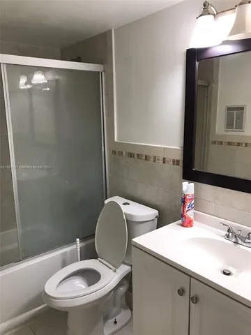 a view of street from balcony