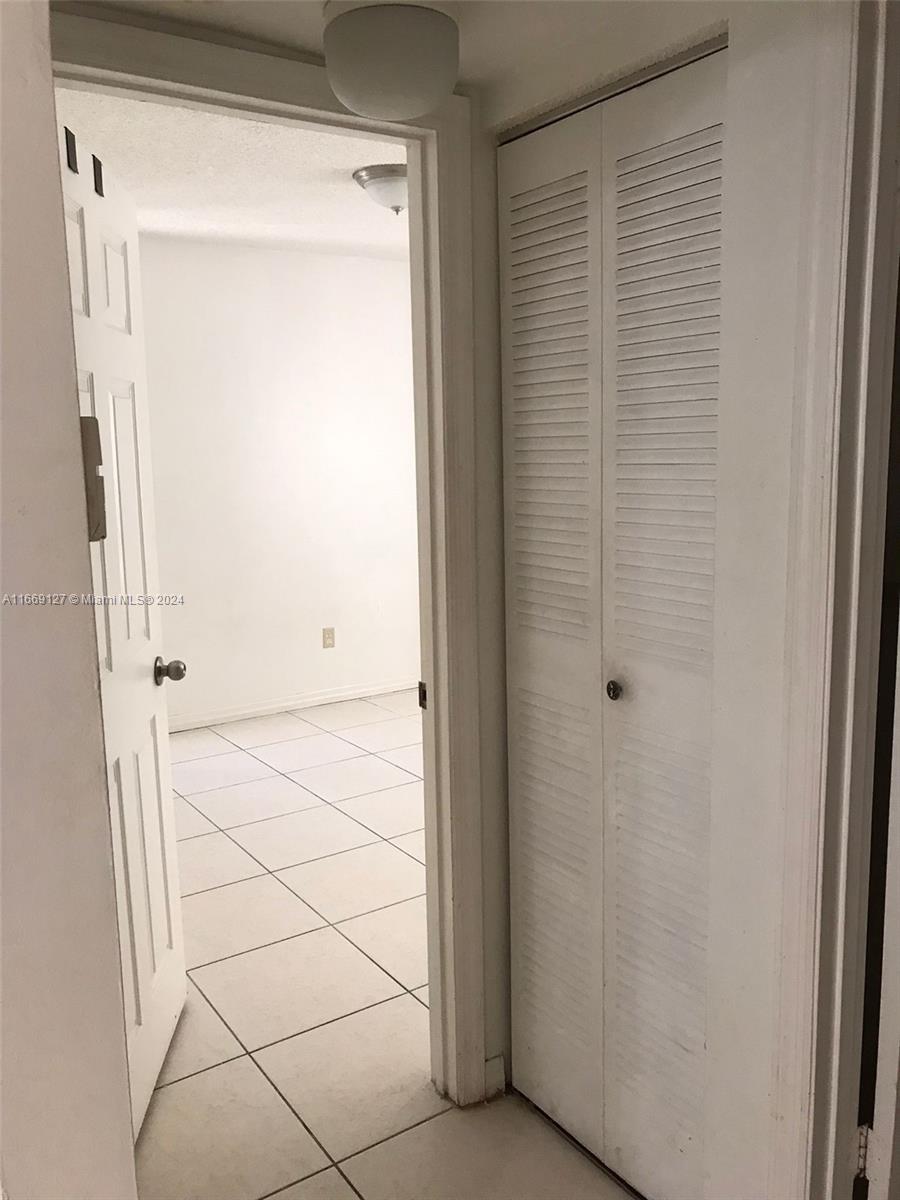 423 Northeast 210th Cir Terrace, Unit 10425 Miami, FL 33179 - Photo 20 of 37 a view of a small space