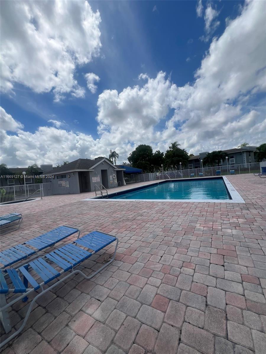 423 Northeast 210th Cir Terrace, Unit 10425 Miami, FL 33179 - Photo 5 of 37 a view of a terrace