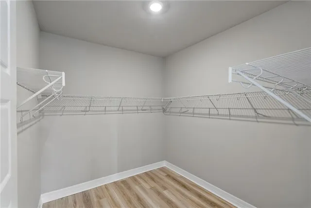 a view of a room with racks on the wall