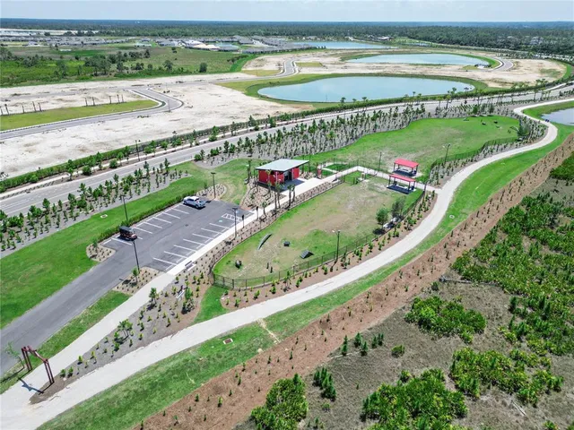 an aerial view of a city and an ocean view