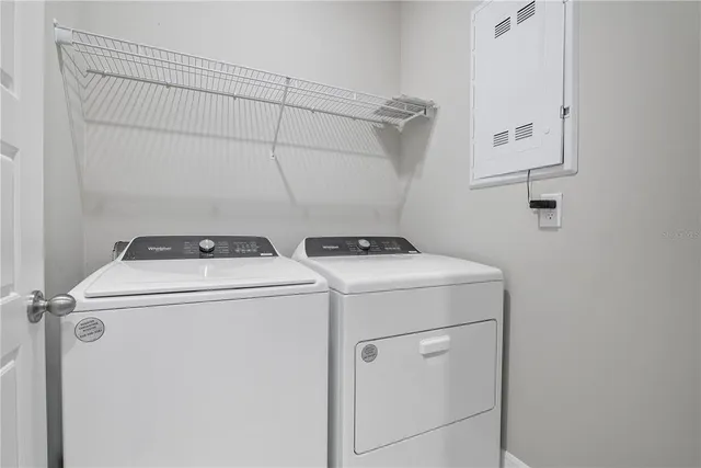 a utility room with dryer and washer