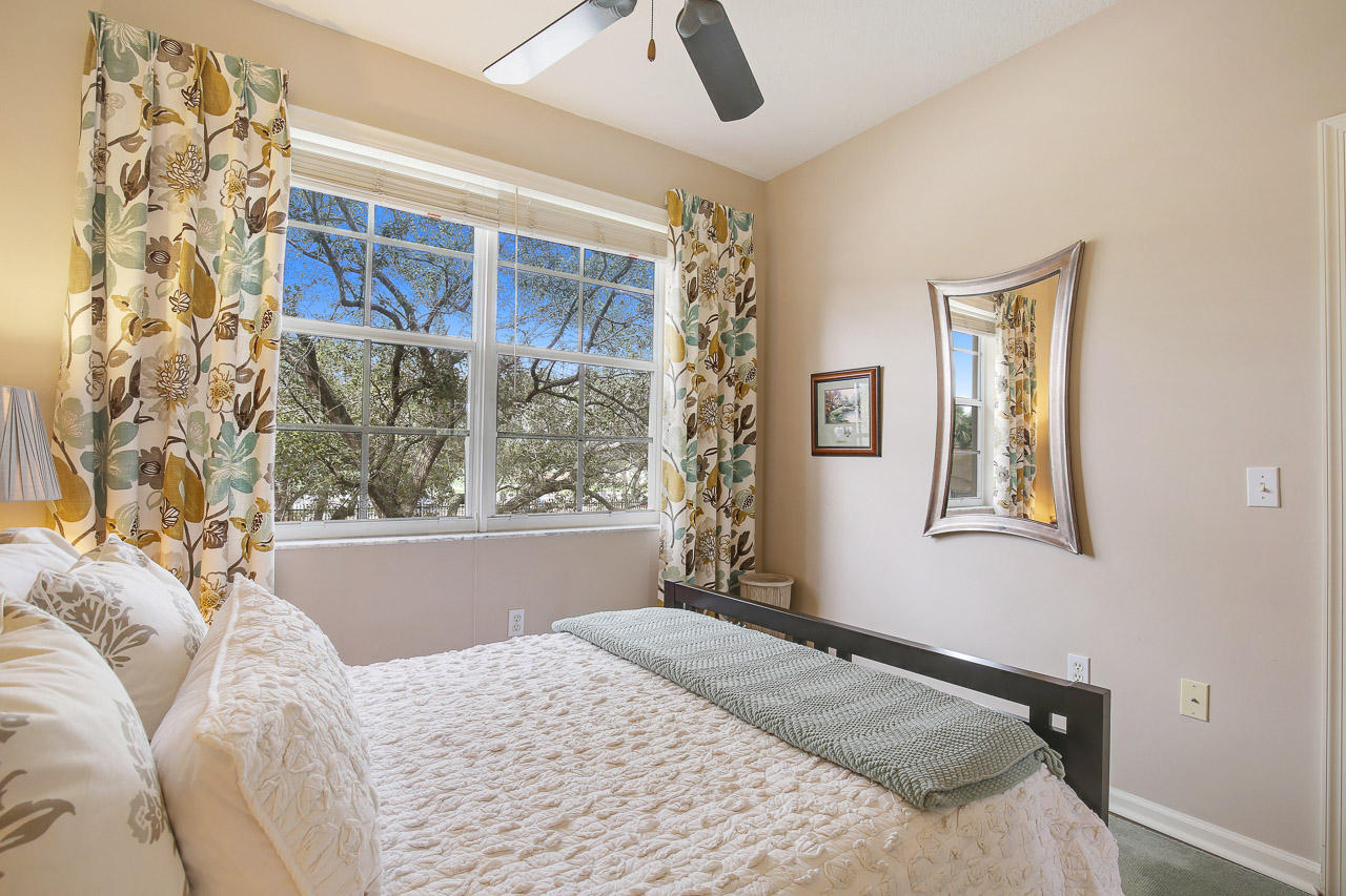 1152 University Boulevard, Unit 22 Jupiter, FL 33458 - Photo 16 of 19 Guest Bedroom