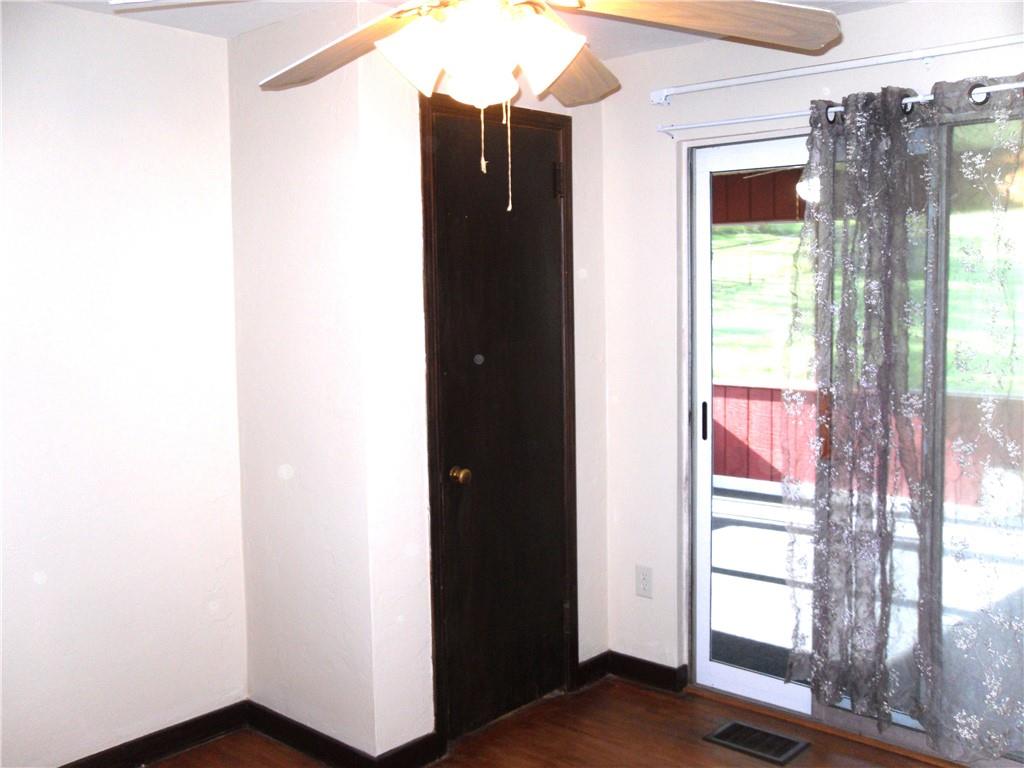 419 Streets Run Road Pittsburgh, PA 15236 - Photo 13 of 46 a view of a small space with wooden floor and a window