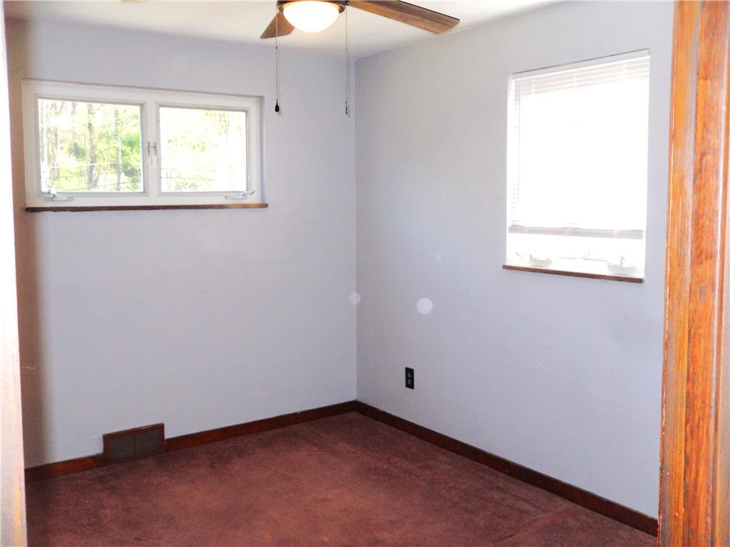 419 Streets Run Road Pittsburgh, PA 15236 - Photo 17 of 46 an empty room with a window