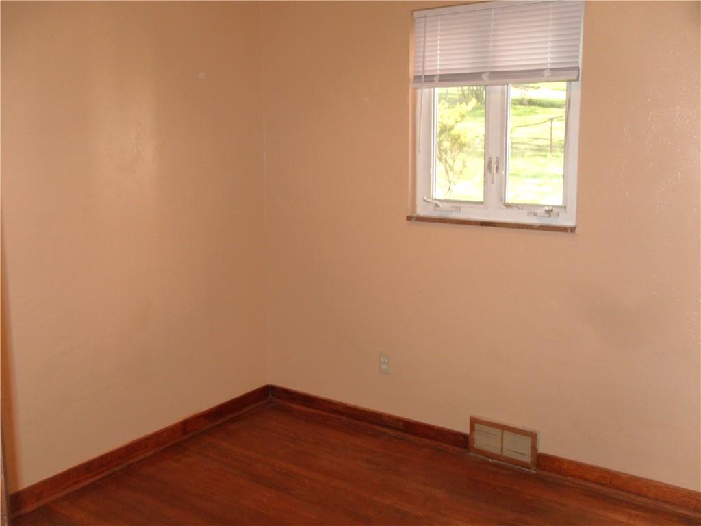 419 Streets Run Road Pittsburgh, PA 15236 - Photo 18 of 46 an empty room with a window