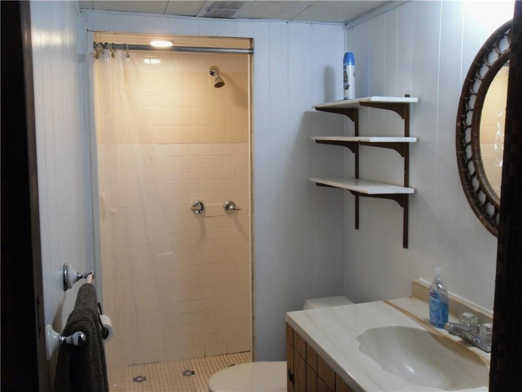 419 Streets Run Road Pittsburgh, PA 15236 - Photo 25 of 46 a bathroom with a sink toilet and vanity