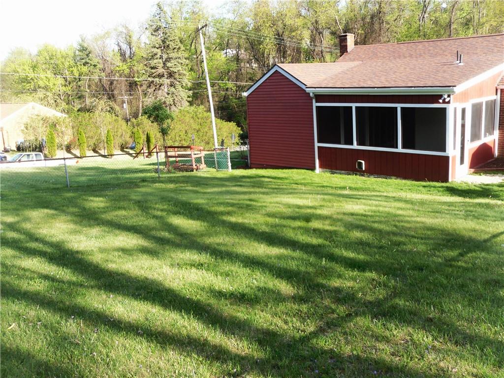 419 Streets Run Road Pittsburgh, PA 15236 - Photo 36 of 46 a view of an house with backyard space and garden