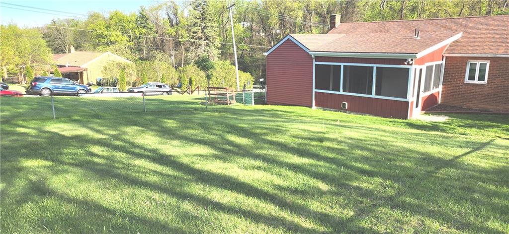 419 Streets Run Road Pittsburgh, PA 15236 - Photo 42 of 46 a view of a house with a backyard