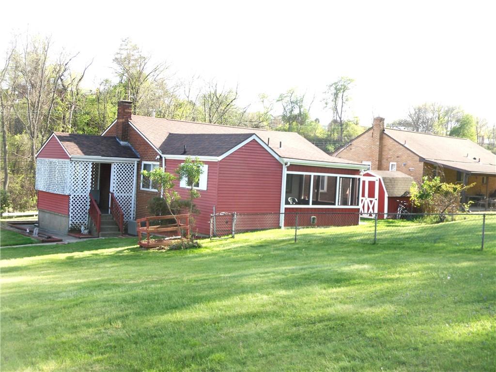 419 Streets Run Road Pittsburgh, PA 15236 - Photo 46 of 46 a view of a house with a yard and sitting area