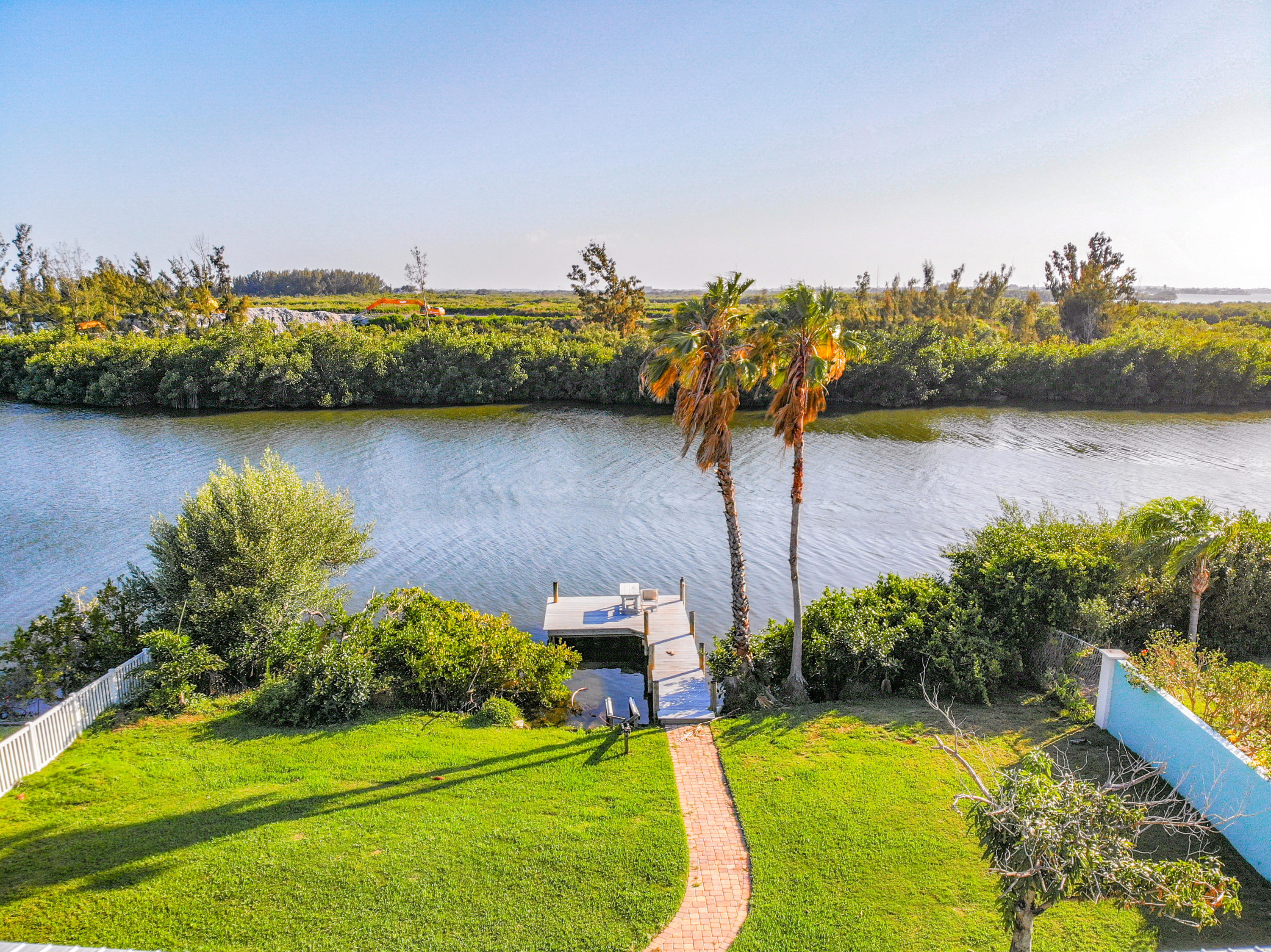 738 Nassau Road Cocoa Beach, FL 32931 - Photo 2 of 26 a view of a lake with houses in outdoor space