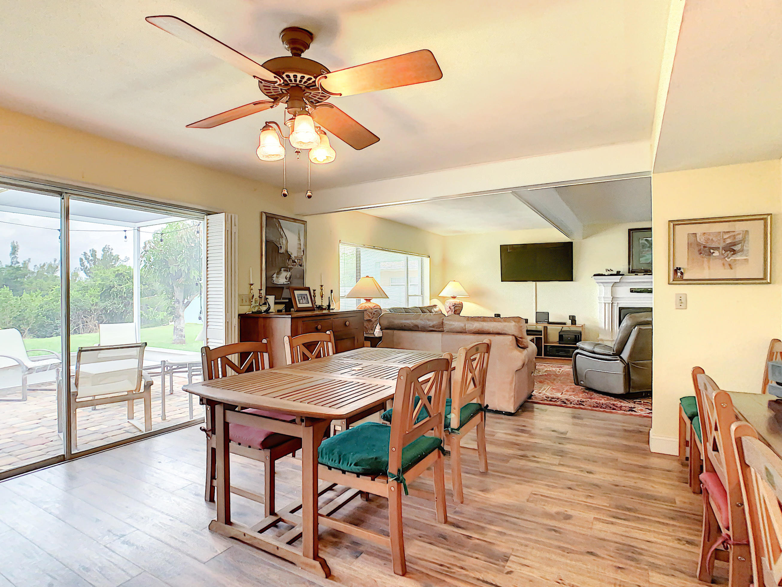738 Nassau Road Cocoa Beach, FL 32931 - Photo 13 of 26 a view of a dining room with furniture window and wooden floor