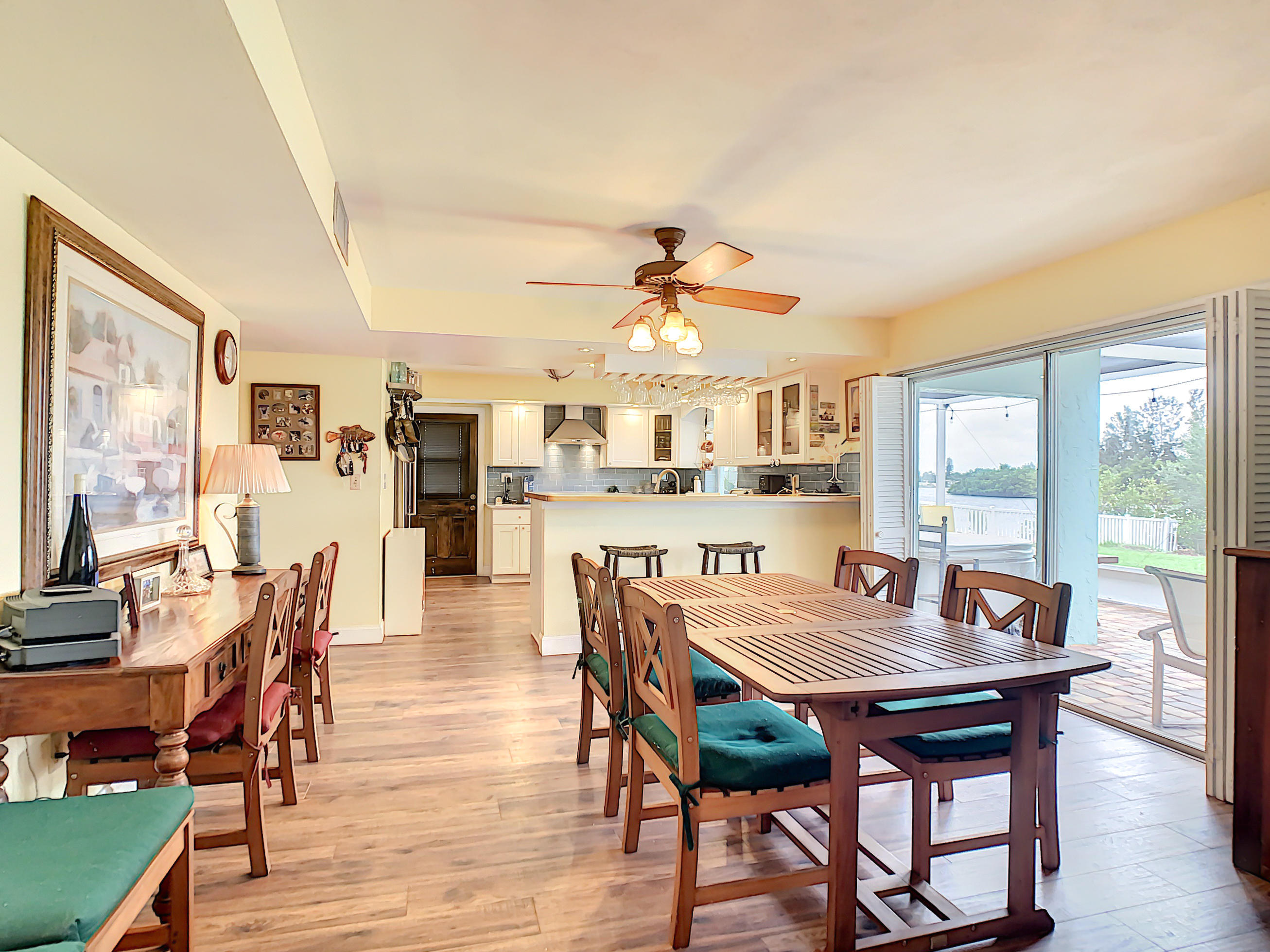 738 Nassau Road Cocoa Beach, FL 32931 - Photo 14 of 26 a view of a dining room with furniture window and wooden floor