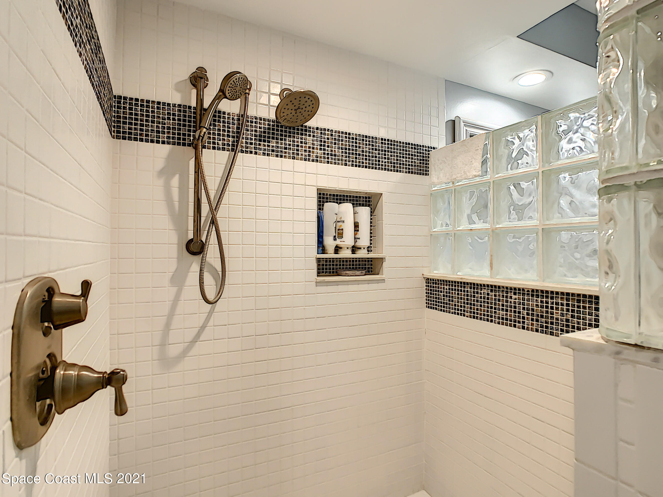 738 Nassau Road Cocoa Beach, FL 32931 - Photo 18 of 26 a bathroom with a shower