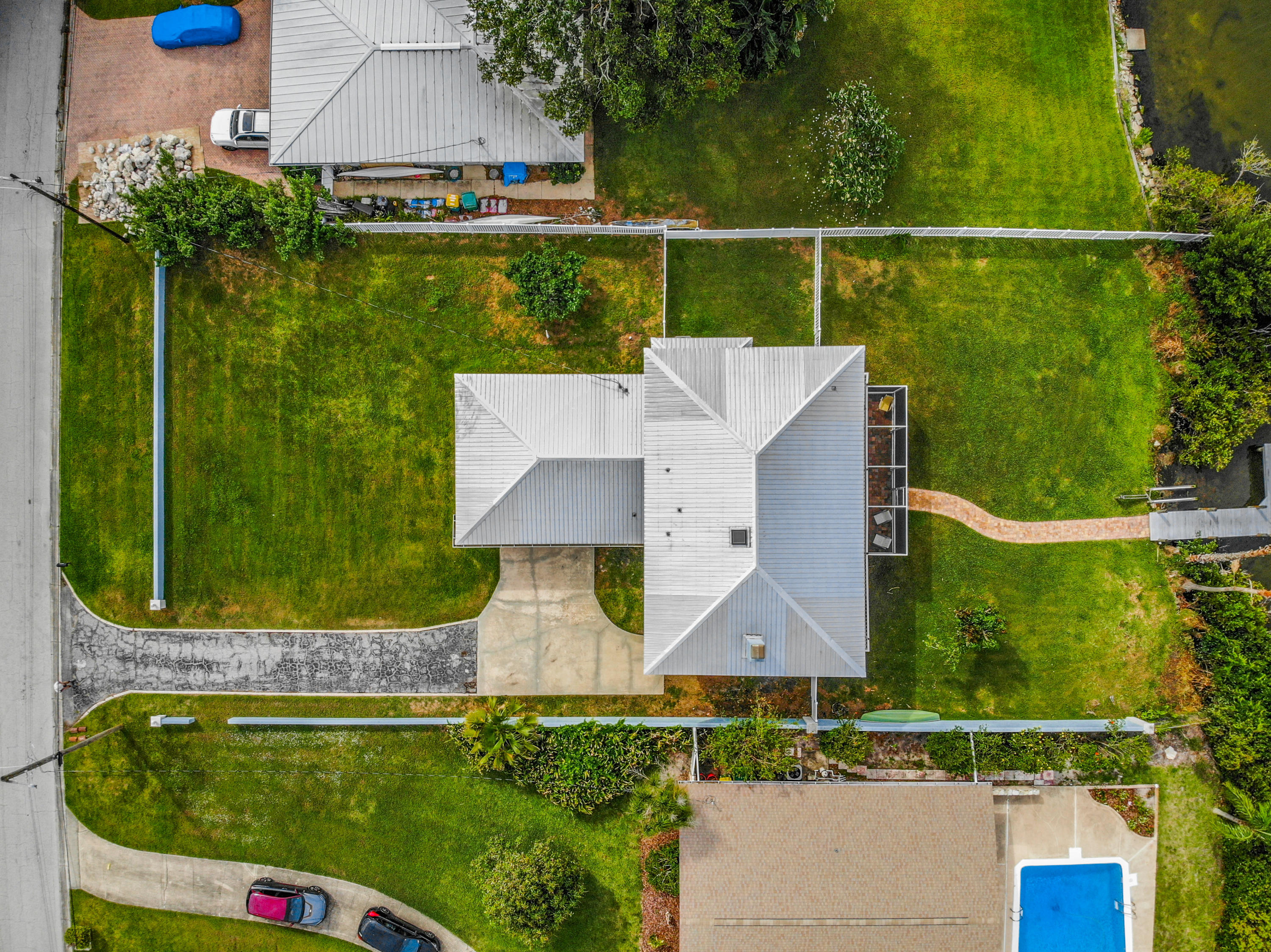 738 Nassau Road Cocoa Beach, FL 32931 - Photo 23 of 26 an aerial view of a house having swimming pool