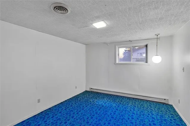 an empty room with a workbench