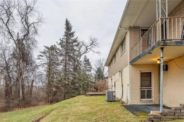 a view of a house with snow on the wall