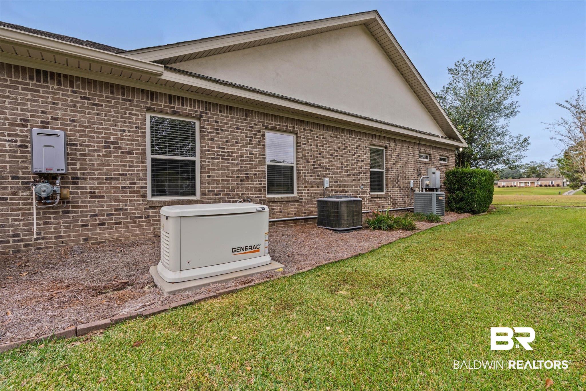 5270 Rodgers Road Eight Mile, AL 36613 - Photo 29 of 38 View of side of home featuring brick siding and a lawn