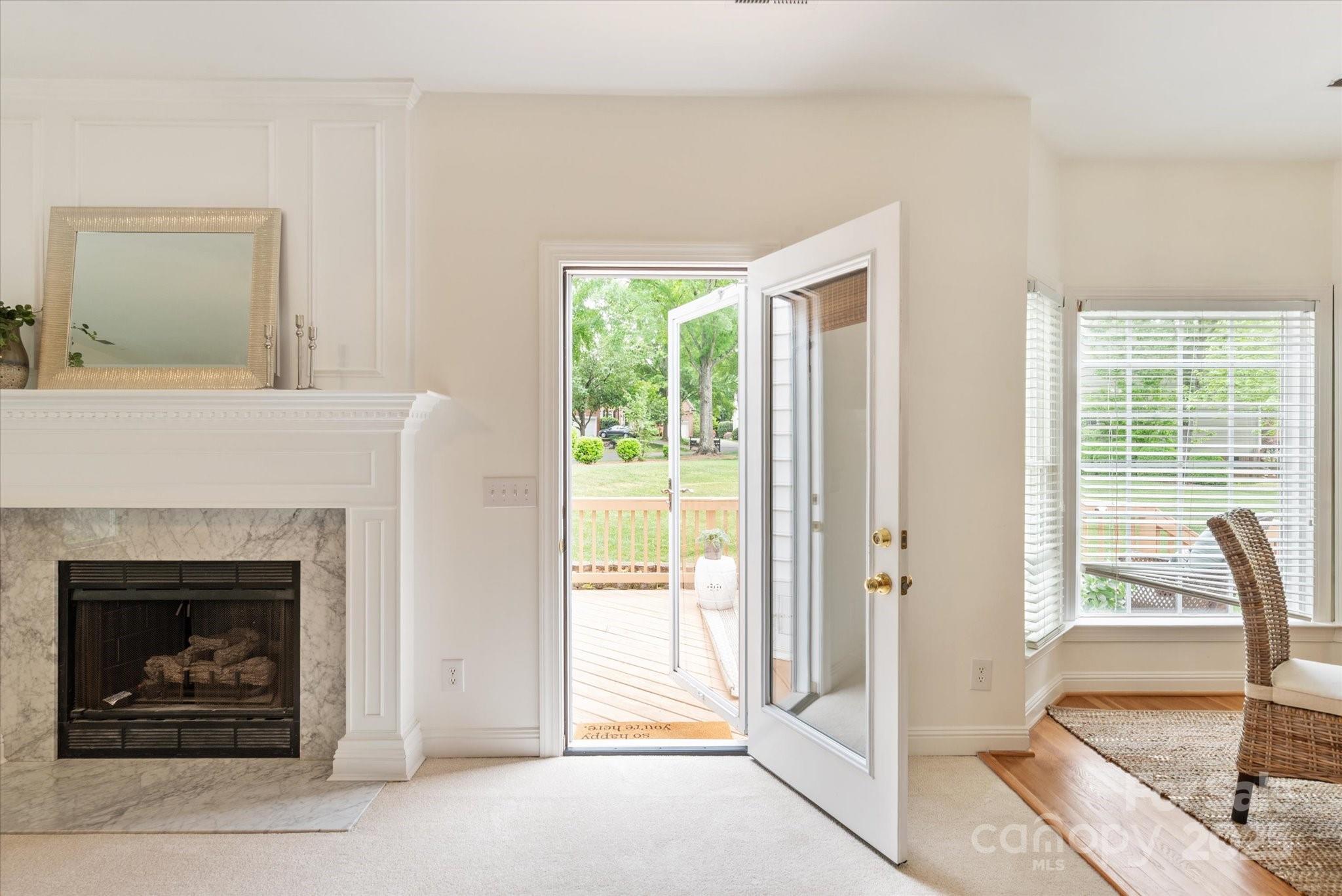 1006 Baldwin Lane Waxhaw, NC 28173 - Photo 19 of 42 a living room with furniture and a fireplace