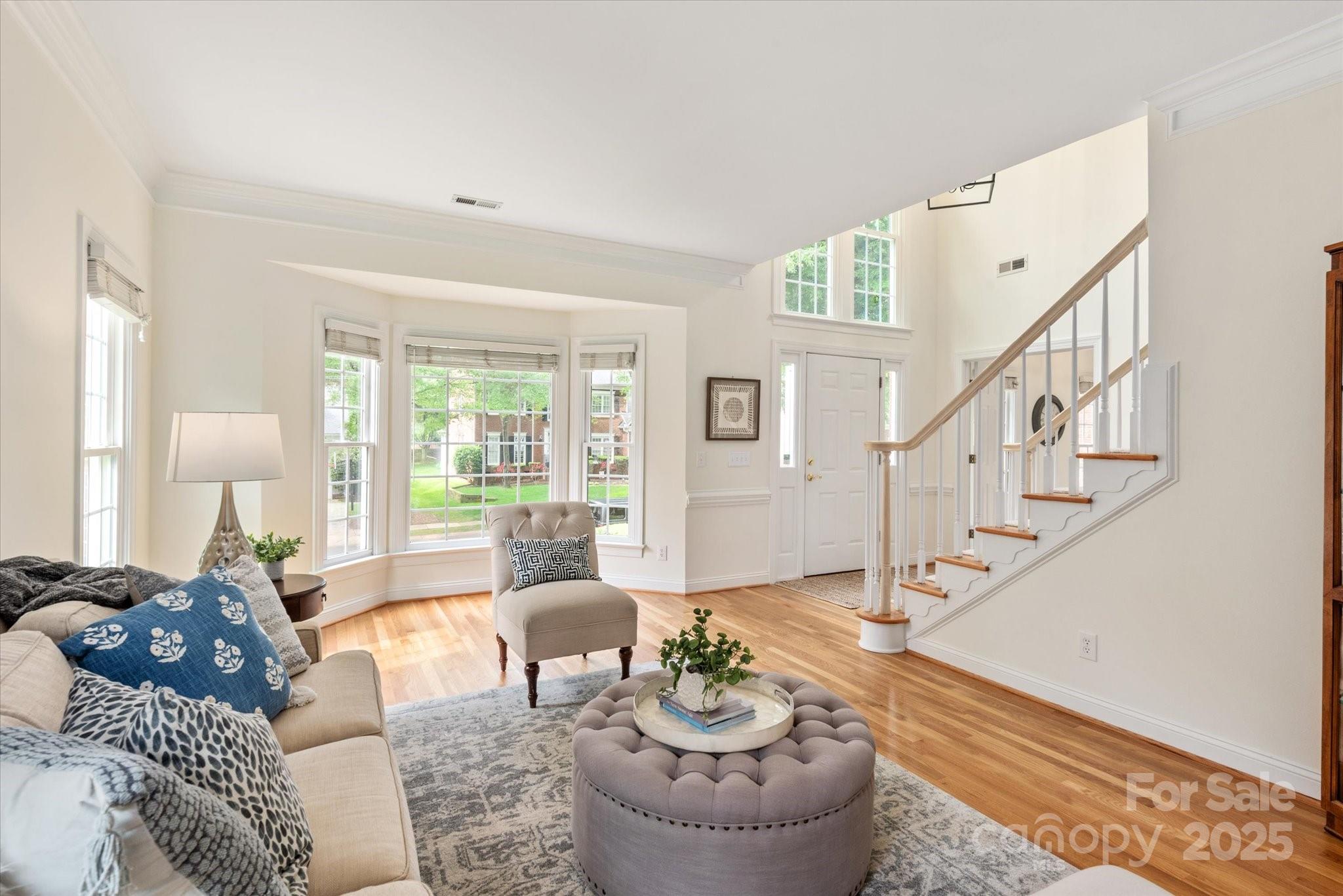 1006 Baldwin Lane Waxhaw, NC 28173 - Photo 3 of 42 a living room with furniture and a large window