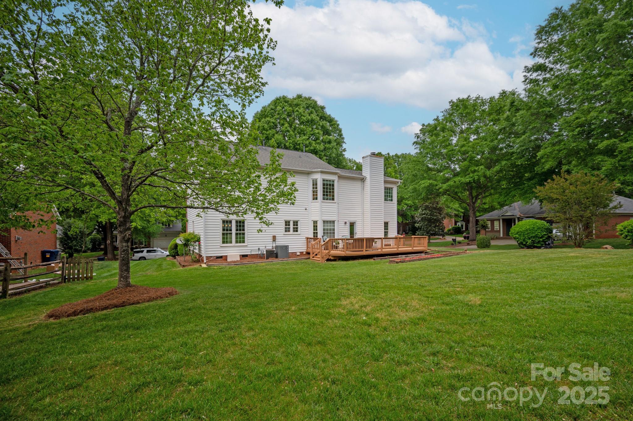 1006 Baldwin Lane Waxhaw, NC 28173 - Photo 40 of 42 a view of a house with a backyard