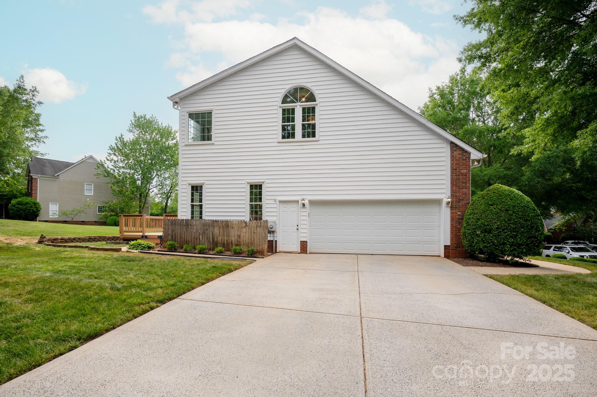 1006 Baldwin Lane Waxhaw, NC 28173 - Photo 41 of 42 a front view of house with yard and green space