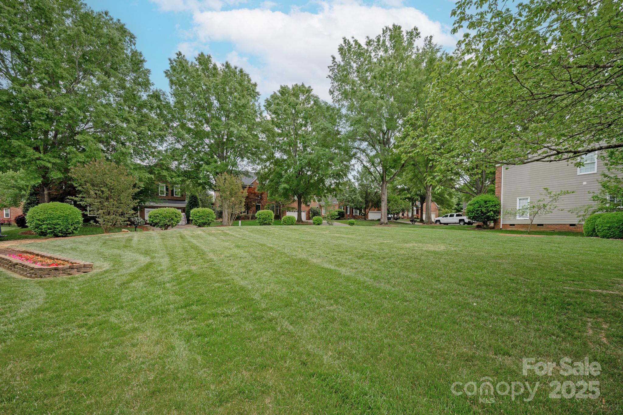 1006 Baldwin Lane Waxhaw, NC 28173 - Photo 42 of 42 a green field with lots of trees in it