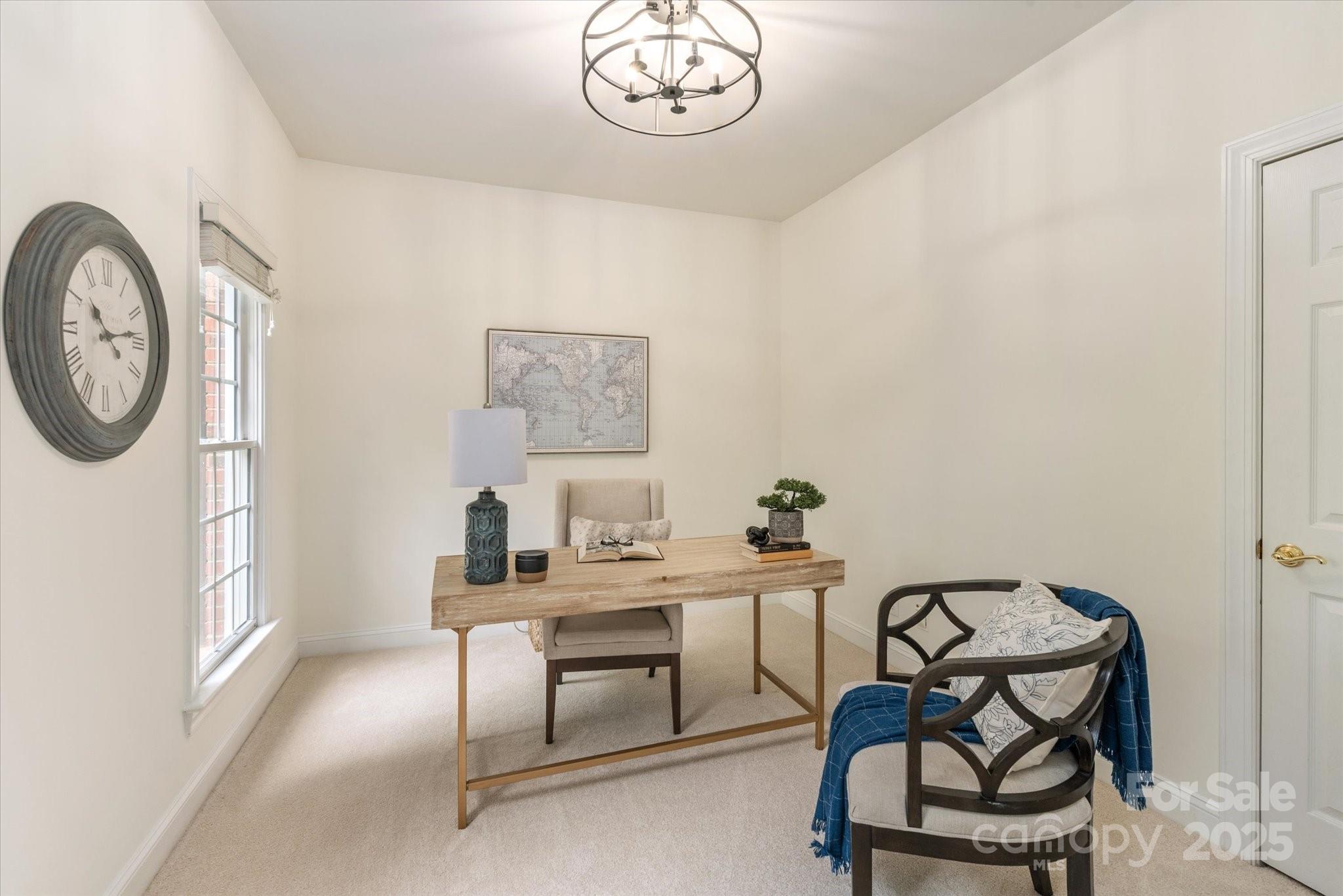 1006 Baldwin Lane Waxhaw, NC 28173 - Photo 5 of 42 a workspace with furniture and a window