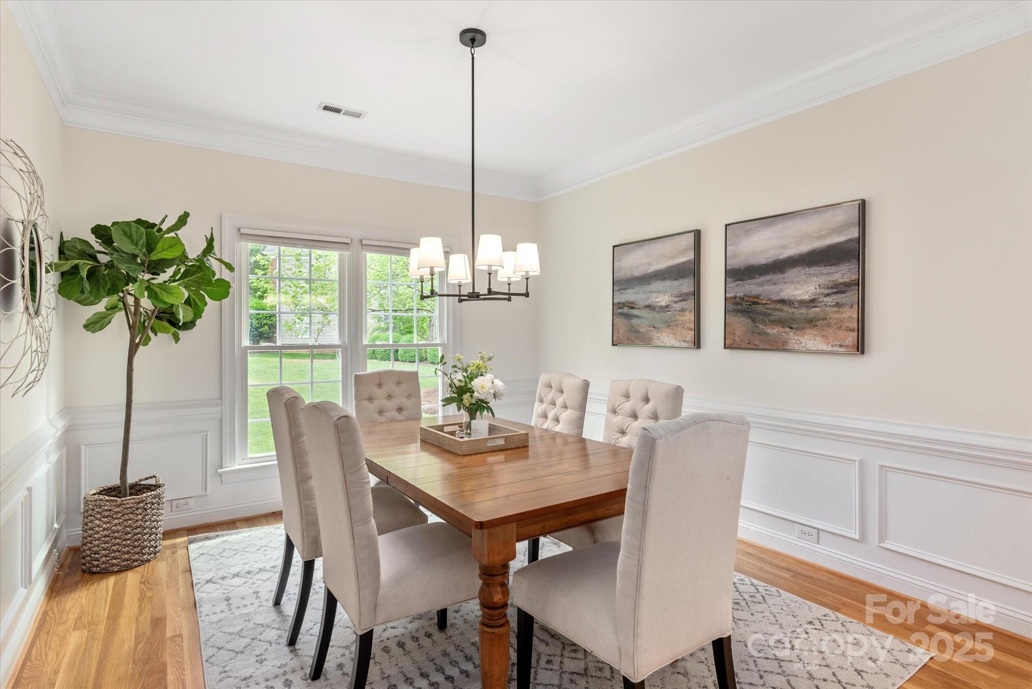 1006 Baldwin Lane Waxhaw, NC 28173 - Photo 6 of 42 a view of a dining room with furniture window and outside view