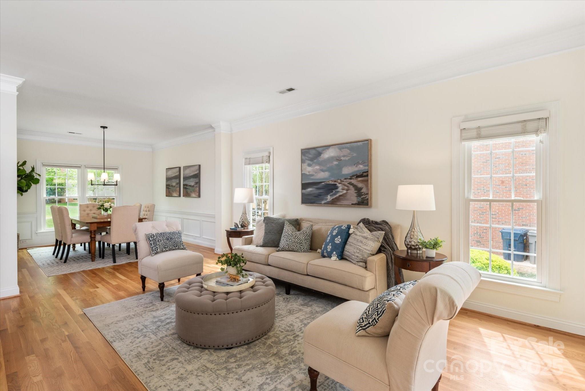 1006 Baldwin Lane Waxhaw, NC 28173 - Photo 8 of 42 a living room with furniture and a large window
