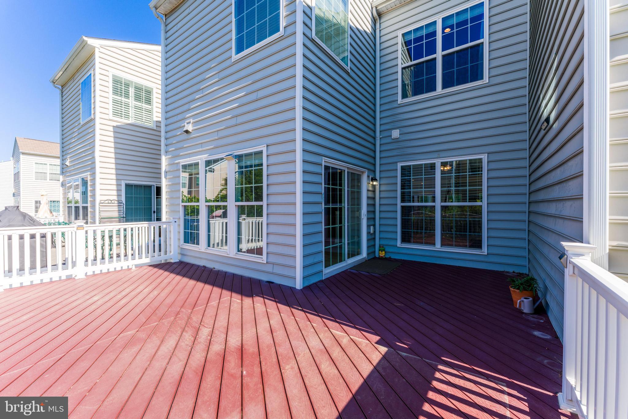 43583 White Cap Terrace Chantilly, VA 20152 - Photo 21 of 55 a view of a house with wooden deck