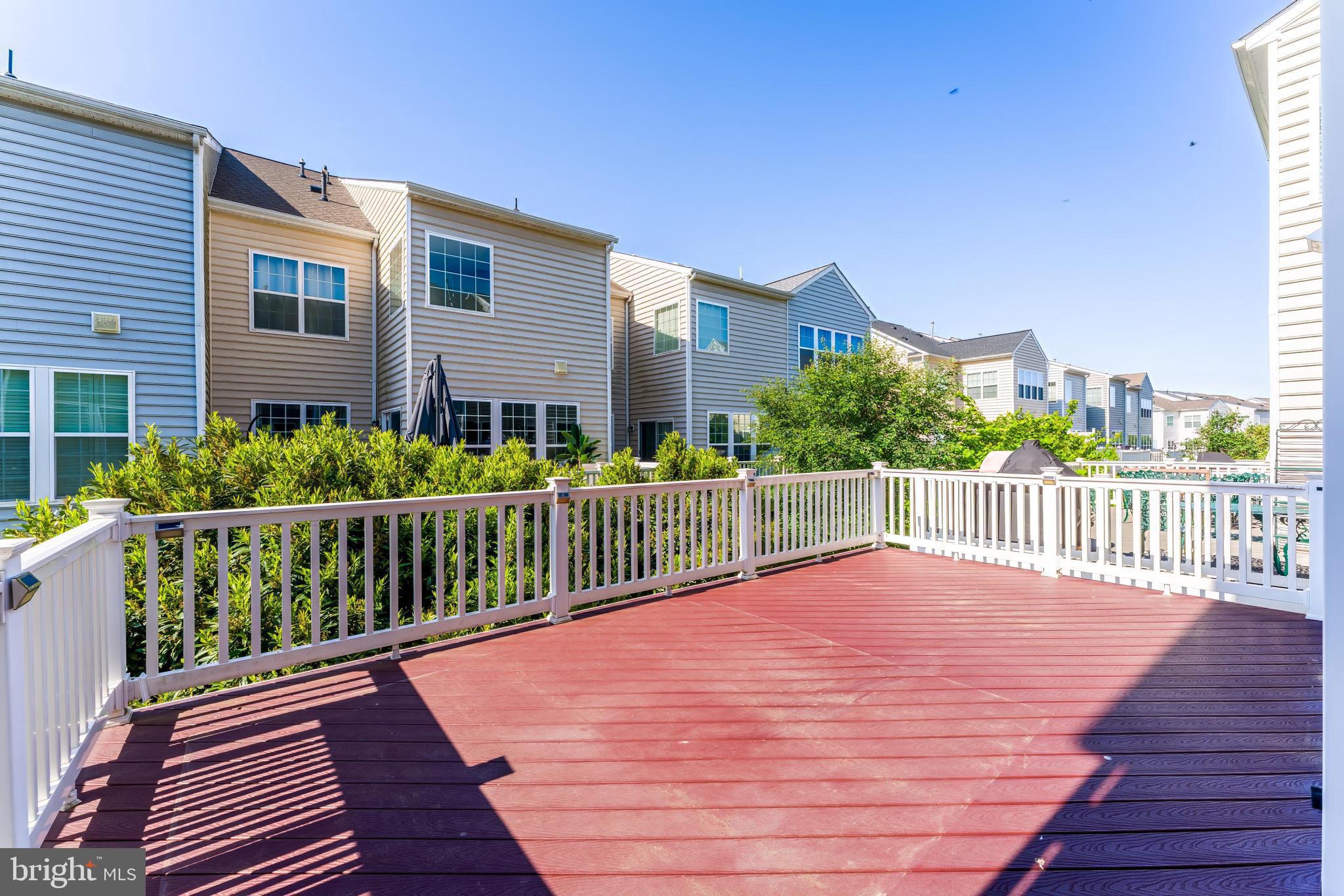 43583 White Cap Terrace Chantilly, VA 20152 - Photo 22 of 55 a view of a balcony with wooden floor