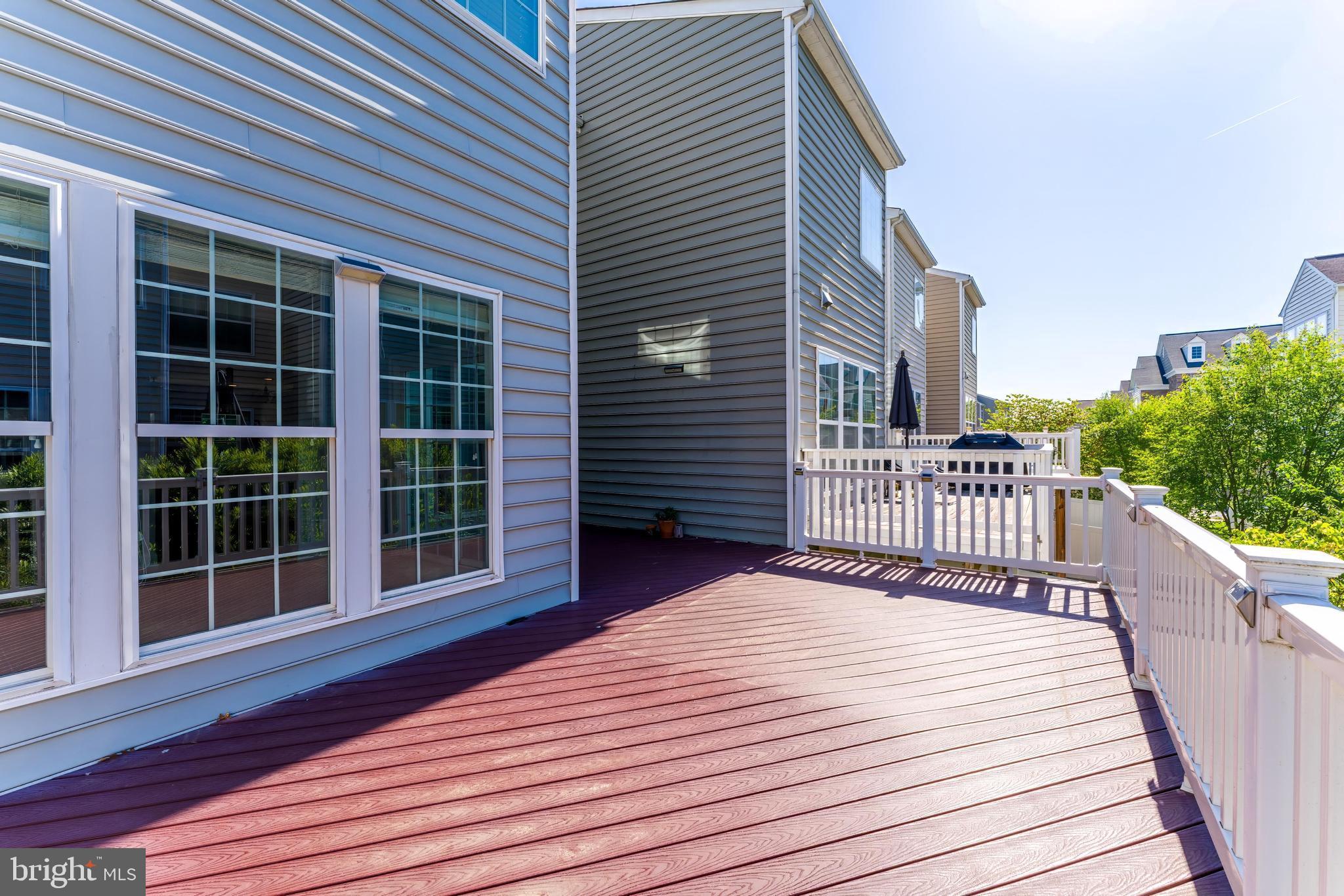 43583 White Cap Terrace Chantilly, VA 20152 - Photo 23 of 55 a balcony view with a wooden floor