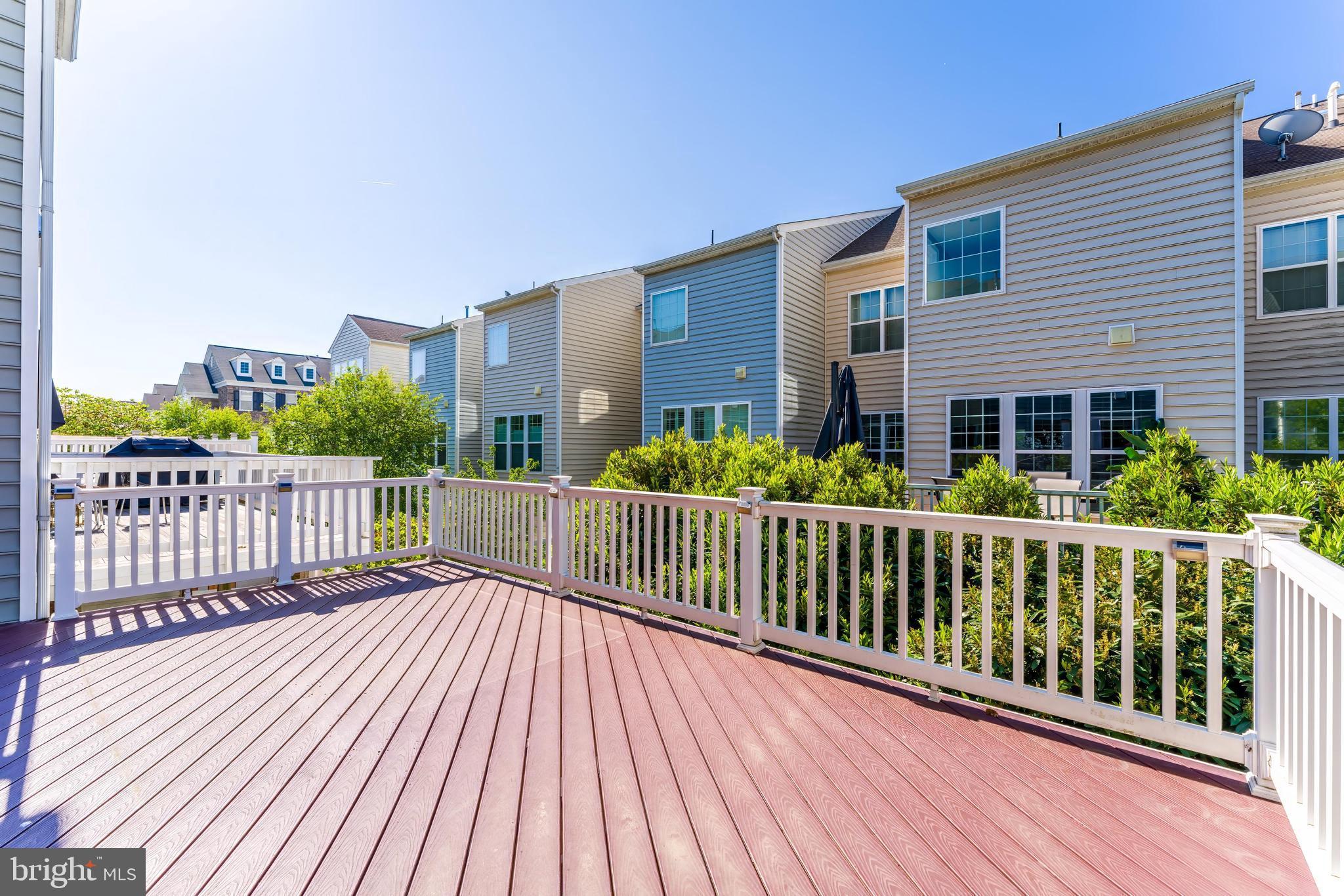 43583 White Cap Terrace Chantilly, VA 20152 - Photo 24 of 55 a view of a house with wooden deck