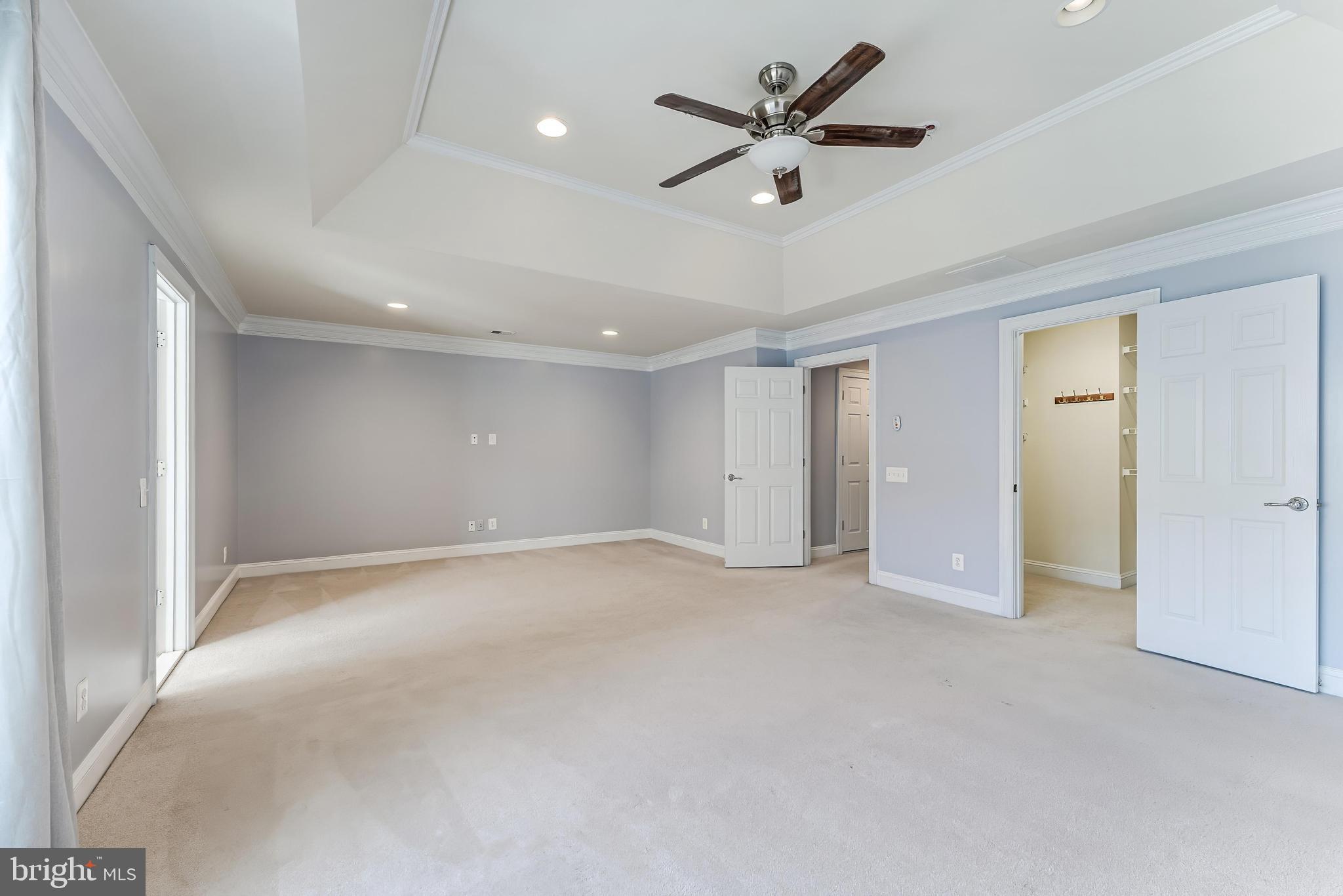 43583 White Cap Terrace Chantilly, VA 20152 - Photo 30 of 55 an empty room with fan and a ceiling fan