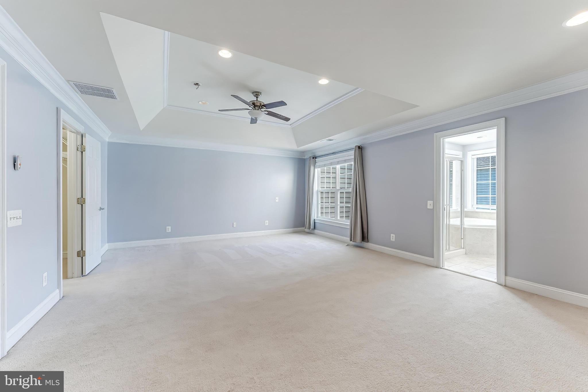 43583 White Cap Terrace Chantilly, VA 20152 - Photo 31 of 55 a view of a livingroom with a ceiling fan and window