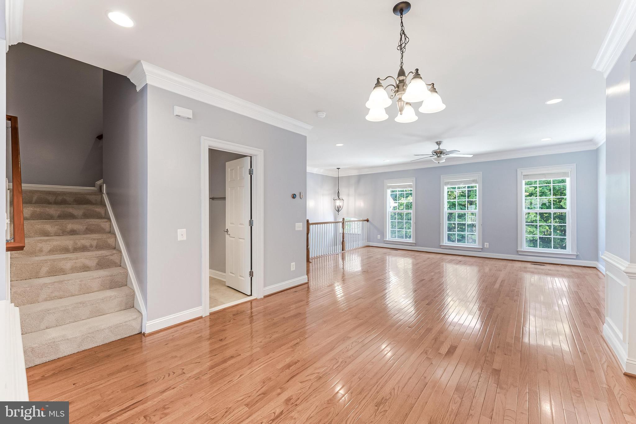 43583 White Cap Terrace Chantilly, VA 20152 - Photo 4 of 55 a view of an room with wooden floor and windows