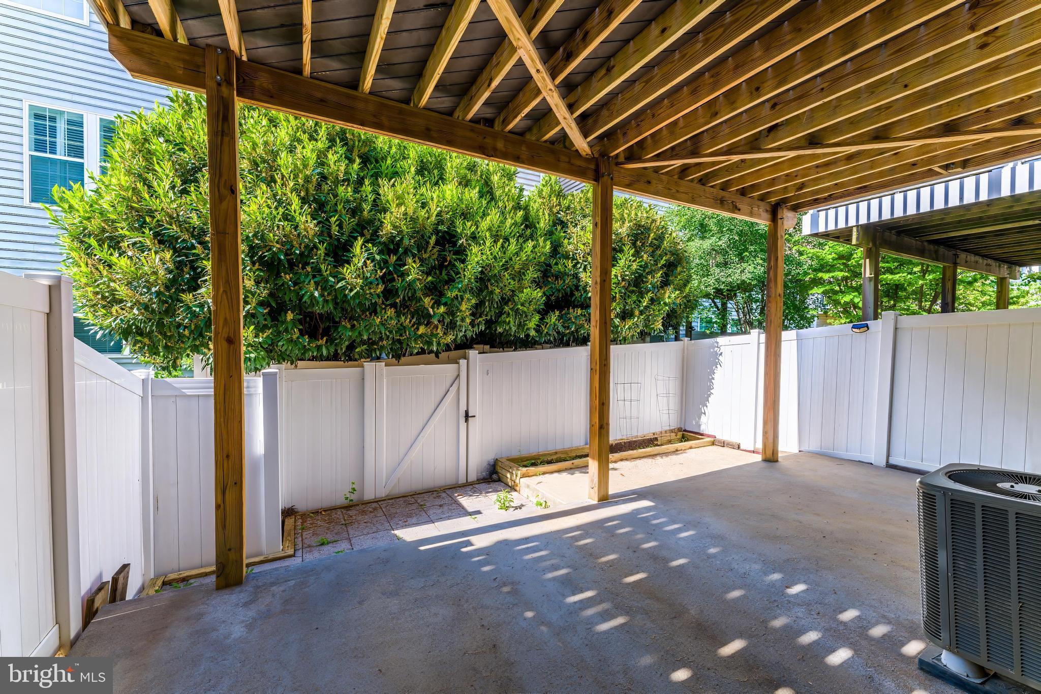 43583 White Cap Terrace Chantilly, VA 20152 - Photo 50 of 55 a view of a backyard