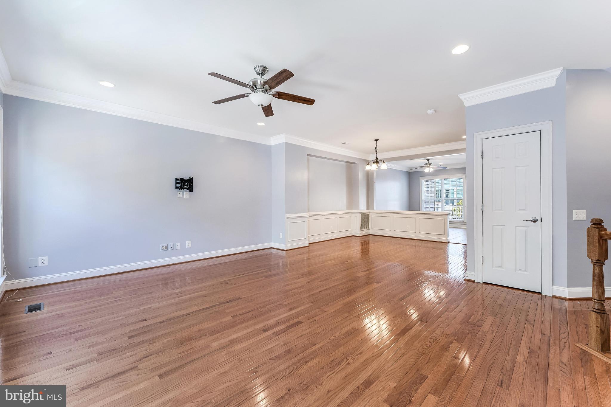 43583 White Cap Terrace Chantilly, VA 20152 - Photo 6 of 55 a view of empty room with wooden floor and window