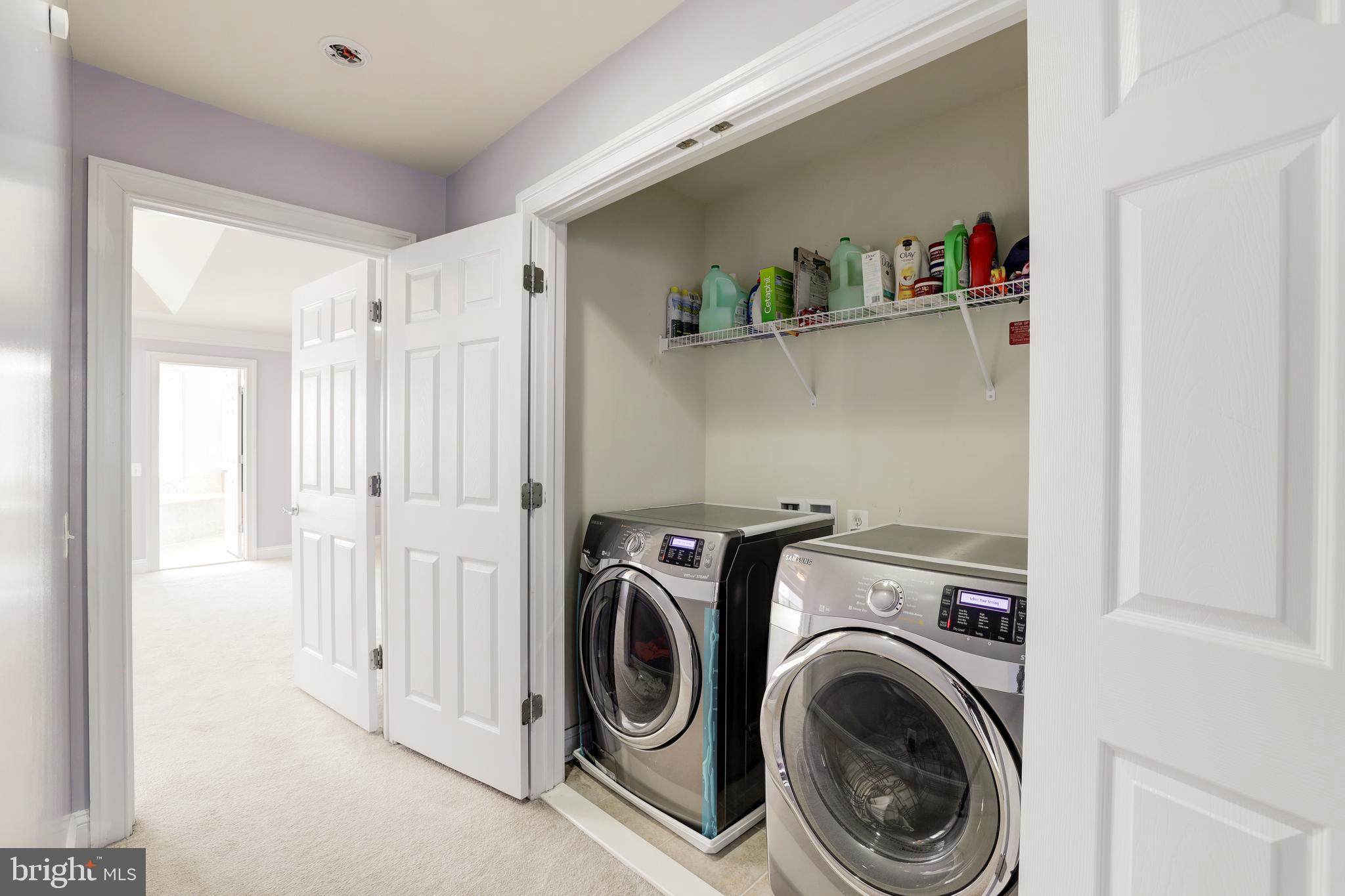 43583 White Cap Terrace Chantilly, VA 20152 - Photo 10 of 18 a view of walk in closet with clothes and shoes