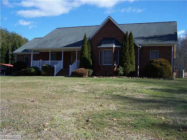 4909 Gold Crest Drive Oak Ridge, NC 27310 - Photo 1 of 16 Exterior Front.