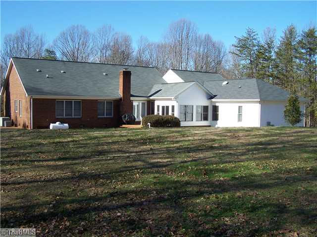 4909 Gold Crest Drive Oak Ridge, NC 27310 - Photo 2 of 16 Exterior Back.