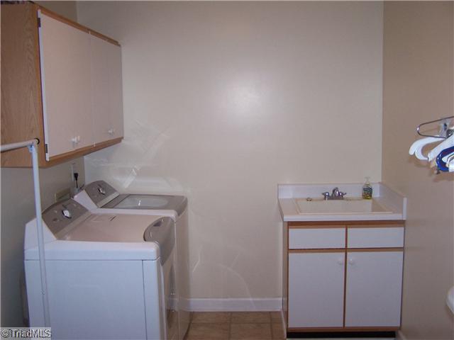 4909 Gold Crest Drive Oak Ridge, NC 27310 - Photo 12 of 16 Laundry Room.