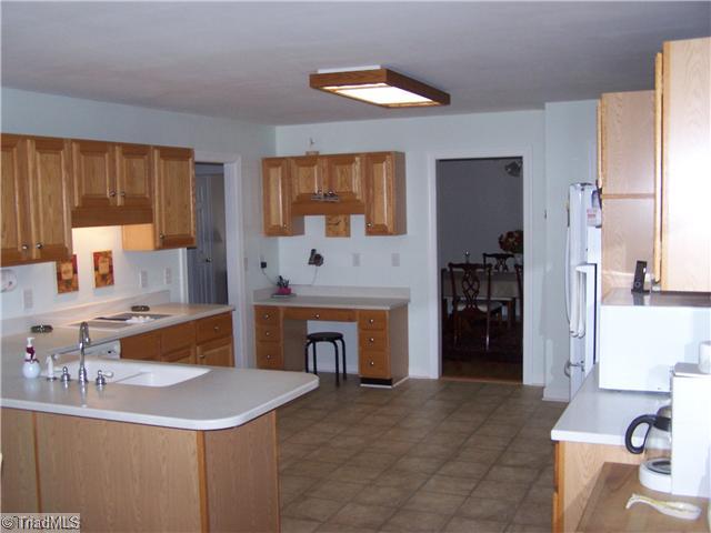 4909 Gold Crest Drive Oak Ridge, NC 27310 - Photo 5 of 16 Kitchen.