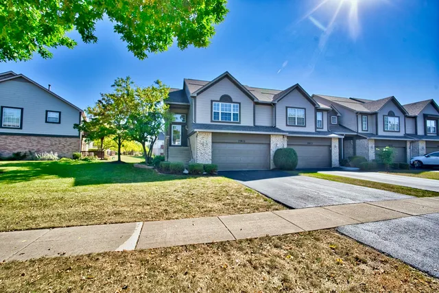a house view with a wooden fencing