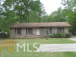 372 South Dean Road Auburn, AL 36830 - Photo 1 of 1 a front view of a house with a yard