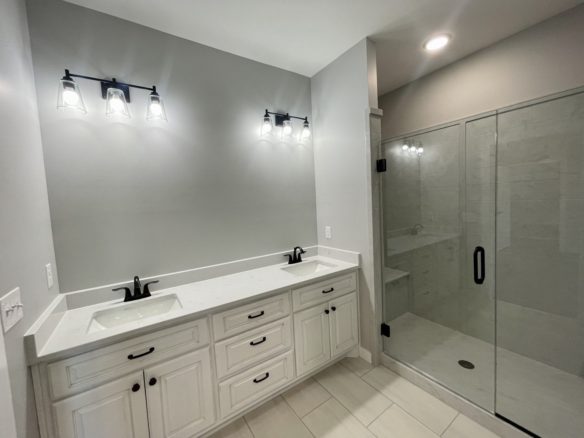 1456 Fall River Road Lawrenceburg, TN 38464 - Photo 15 of 30 a bathroom with a shower sink and mirror