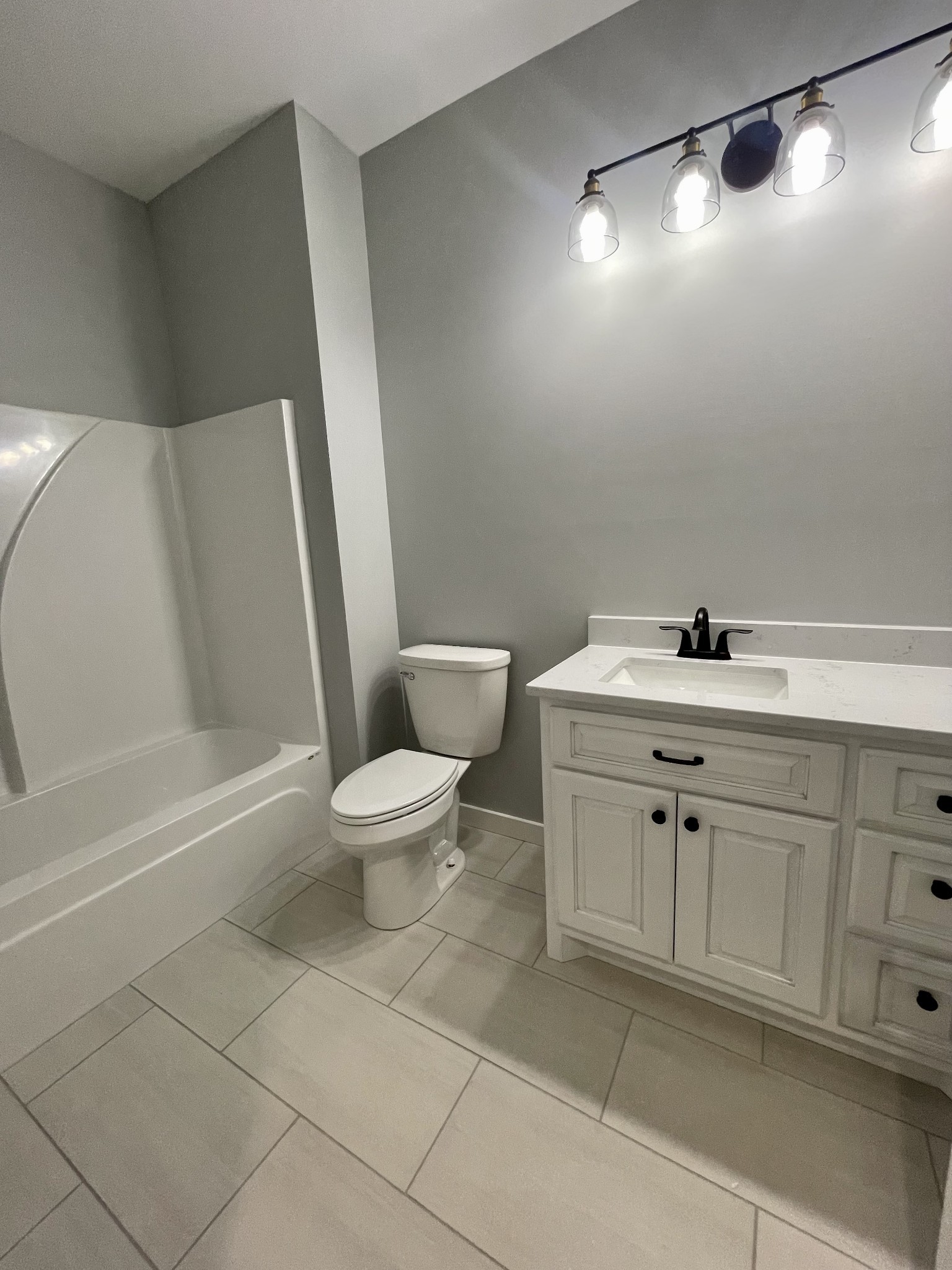 1456 Fall River Road Lawrenceburg, TN 38464 - Photo 23 of 30 a bathroom with a toilet sink and mirror