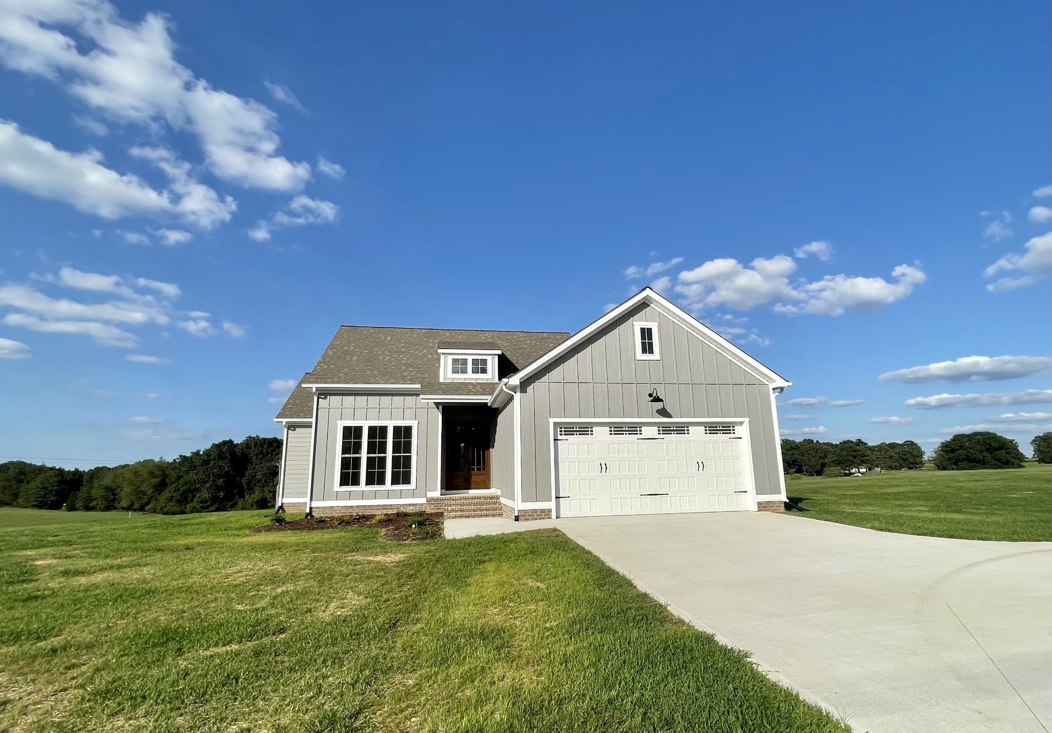 1456 Fall River Road Lawrenceburg, TN 38464 - Photo 29 of 30 a front view of a house with garden